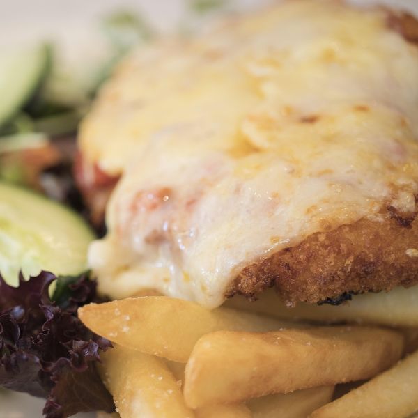 Chicken Parma: Hideaway from the daily grind with a pub classic done right.